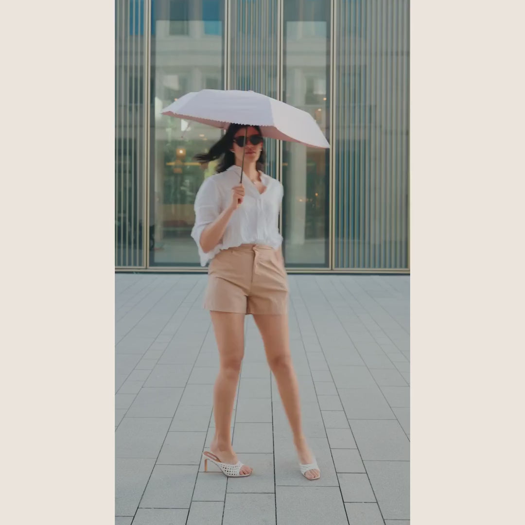 Sunbarry Romantic Breezer UV umbrella lifestyle video – heart trim and gold handle, certified UPF 50+#Color_Blush Rosé